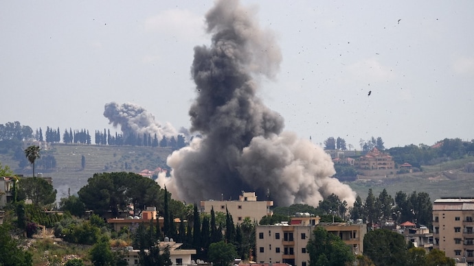 Reuters) Smoke billows from southern Lebanon, following Israeli strikes, as seen from Nabatieh, Lebanon.