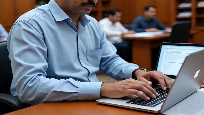 man working on laptop