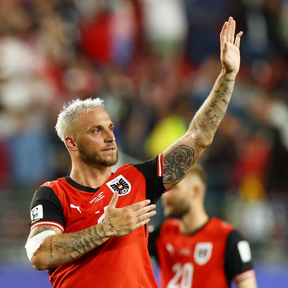Austria score 3 past Jordan to go second behind Argentina in Group J