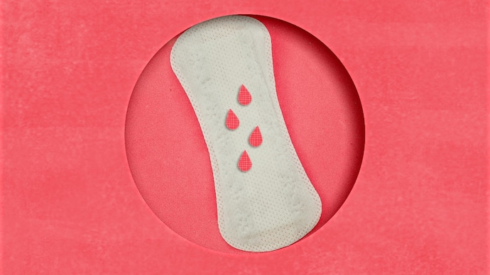 Menstrual tampons and pads in cosmetic bag. Menstruation time. Hygiene and protection