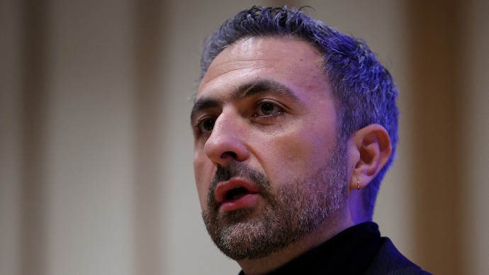 Microsoft's AI chief Mustafa Suleyman now insists that AI will not wipe out all jobs. (Photos: Reuters) Mustafa Suleyman,