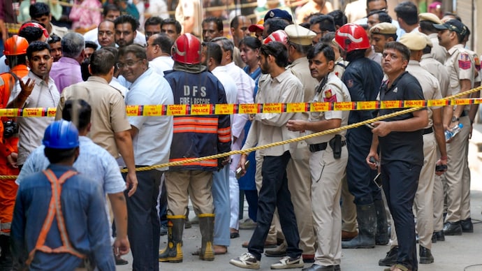 New Delhi: Police cordon off the area after a fire broke out at a bed-and-breakfast in a five-storey building in south Delhi's Malviya Nagar area. (PTI) New Delhi: Police cordon off the area after a fire broke out at a bed-and-breakfast in a five-storey building in south Delhi's Malviya Nagar area. (PTI)