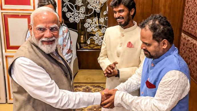 PM Modi meets Ashok Pathak, Durgesh Kumar in Delhi