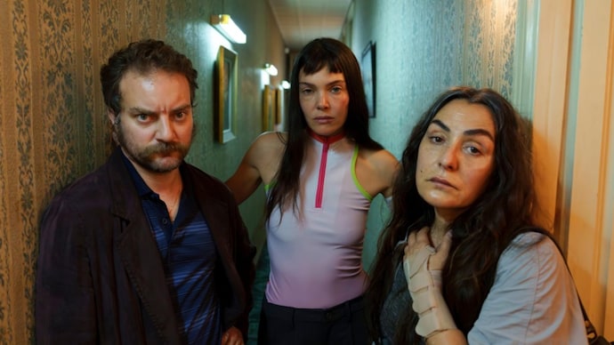 Pol Lopez (Left), Ana Rujas (Centre), Candela Pena (Right) in a still from The Marked Woman.