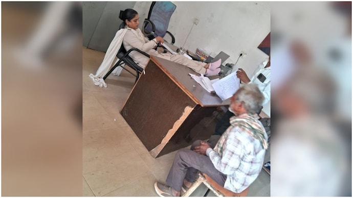 Rajasthan woman cop puts feet on desk as elderly complainant waits suspended