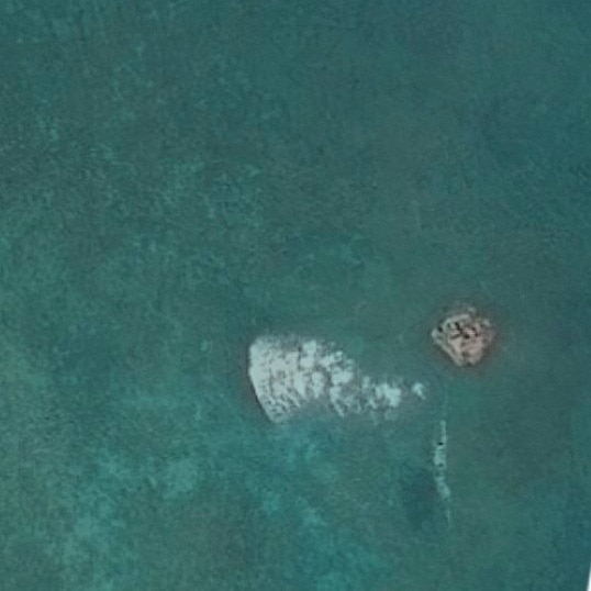 Satellite pics show mystery structure in disputed South China Sea, vanishes later