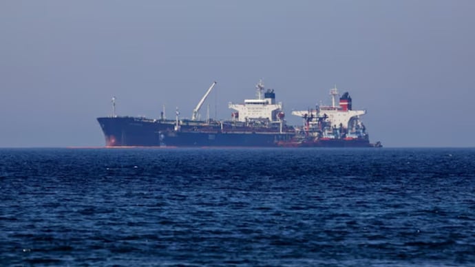 The Liberian-flagged tanker Ice Energy, chartered by the US government, takes Iranian oil from Iranian-flagged Lana. (Image: Reuters)