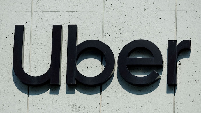 Uber is limiting access to AI tools like Claude Code and Cursor as rising costs force companies to rein in AI spending. (File Photo/Reuters) Uber