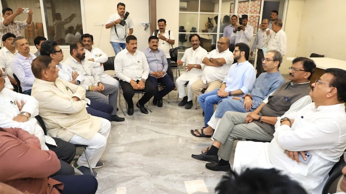 Uddhav Thackeray with party MLAs who attended the meeting.