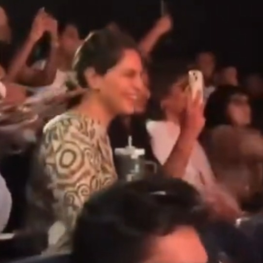 Upasana joins fans, showers confetti at Ram Charan's Peddi screening. Video