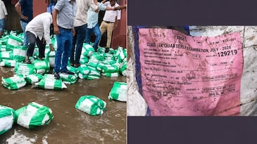 Watch: Bihar board exam papers found floating in rainwater, viral video sparks row Watch: Bihar board exam papers found floating in rainwater, viral video sparks row