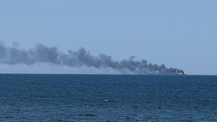Smoke rises from a civilian vessel on fire in Odesa. (Photo: Reuters/File)