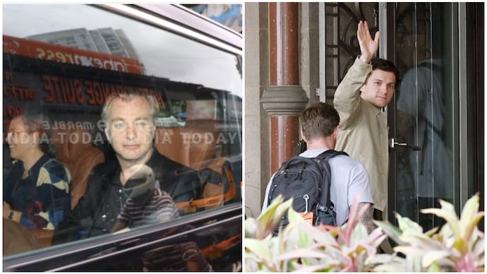 Christopher Nolan (L), Tom Holland (R) land in Mumbai.