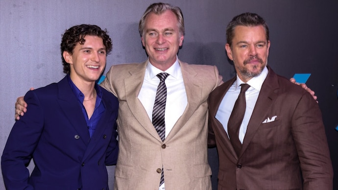 Tom Holland, Christopher Nolan and Matt Damon during The Odyssey's Mumbai premiere. (Credit: PTI) Christopher Nolan too tough to impress? Tom Holland, Matt Damon reveal
