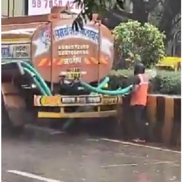 Viral: Civic workers water roadside plants in Pune in heavy rain. Internet is baffled