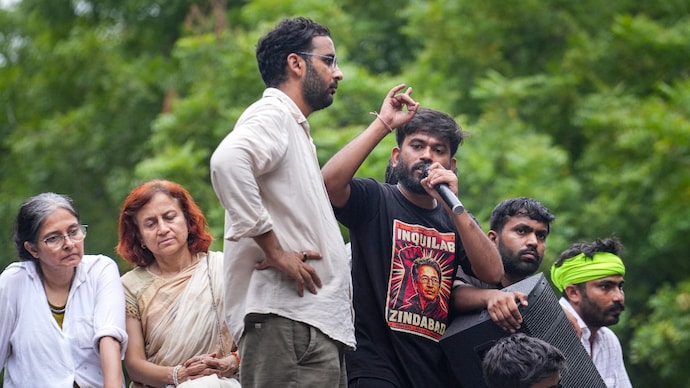 Cockroach Janata Party (CJP) founder Abhijeet Dipke speaks following a protest demanding the resignation of Union Education Minister Dharmendra Pradhan over alleged irregularities in the NEET examination, at Jantar Mantar. (PTI)