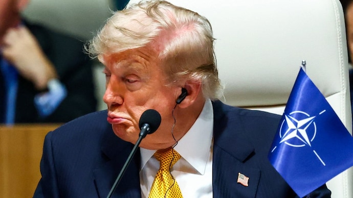 US President Donald Trump attends a meeting at NATO leaders' summit in Ankara