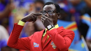 Congo's 'human statue' honours a murdered national hero at every football match Congo's 'human statue' honours a murdered national hero at every football match