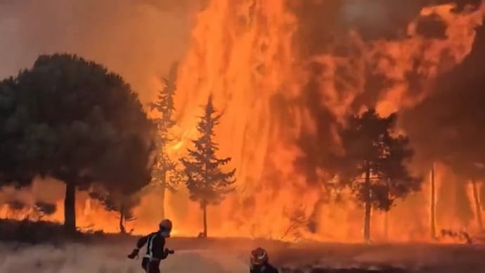 Firefighters battle a wildfire in Europe, where blazes have burned tens of thousands of hectares in the region's worst fire on record. (Photo: X/@WeatherProf)
