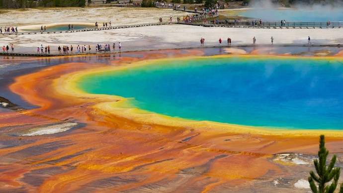 Grand Prismatic Spring in Yellowstone's Midway Geyser Basin, where two tourists were filmed walking in a restricted area. (Photo: Unsplash)