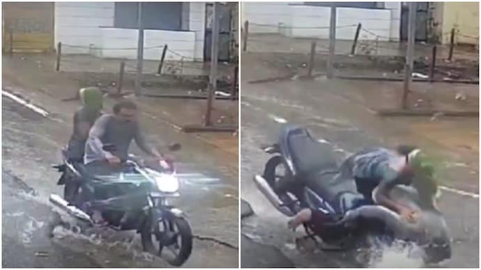 Gujarat couple riding bike without helmets crash into pothole, caught on camera