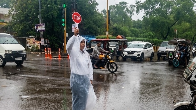 Heavy rain led to waterlogging and traffic disruptions across Delhi. Traffic Police assisted stranded motorists, issued advisories and deployed teams to clear affected roads and restore traffic movement. (Image: X/@DcpTraffic8)