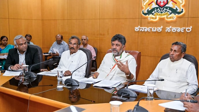 Karnataka Chief Minister DK Shivakumar fellow cabinet members Minister Priyank Kharge (extreme left) KJ George (second from left) and KH Muniyappa (right). (Photo: PTI)
