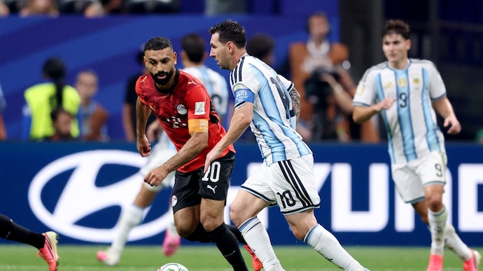 Mo Sala and Lionel Messi
