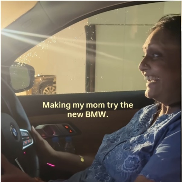 A mom's priceless smile in son's new BMW is the internet's favourite thing today