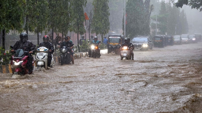 mumbai IMD red alert waterlogging heavy rainfall