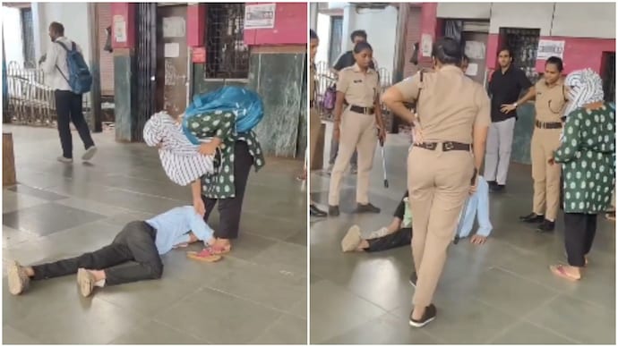 Mumbai man lies on railway platform holds woman feet