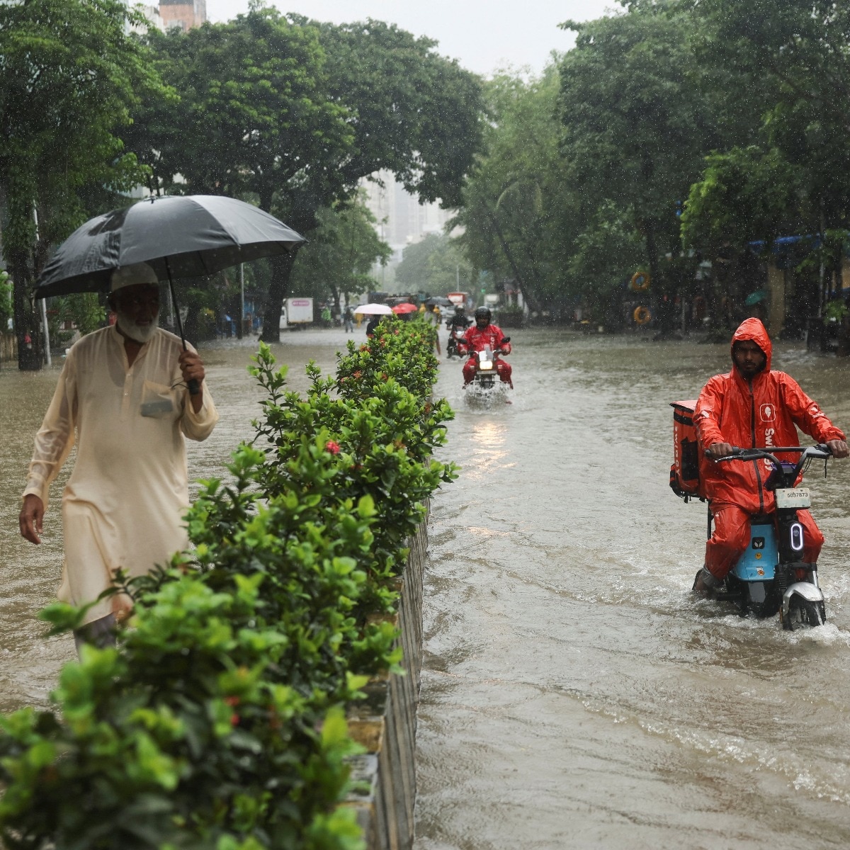 Vehicles stranded, train tracks flooded: Mumbai reels under monsoon fury