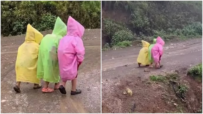 Nepal schoolchildren in raincoats walk uphill hand-in-hand, sight is too cute to miss (Photos: @anil_bud.810/Instagram) Nepal schoolchildren in raincoats seen walking uphill holding hands, internet loves it