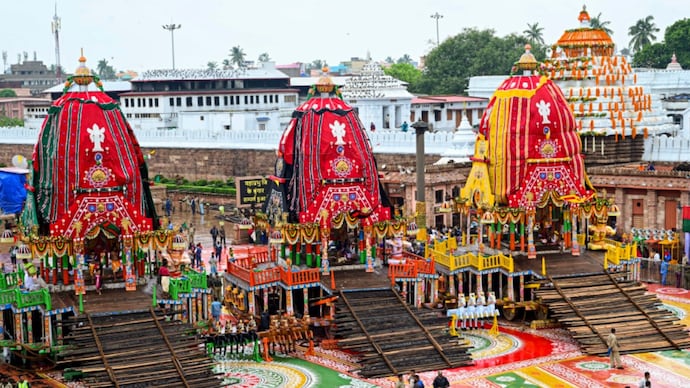 People gather near chariots of Lord Jagannath, Lord Balabhadra and Goddess Subhadra on the occasion of the Rath Yatra festival in Puri. (PTI photo)