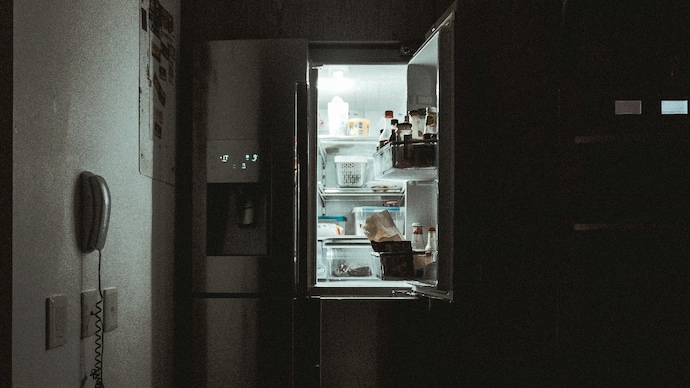 Psychology says opening the fridge again and again may be about more than hunger