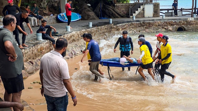 Rescue personnel carry out operations after a speedboat carrying Indian tourists capsized near Hon May Rut Ngoai off Phu Quoc Island, Vietnam, on Saturday. (PTI)