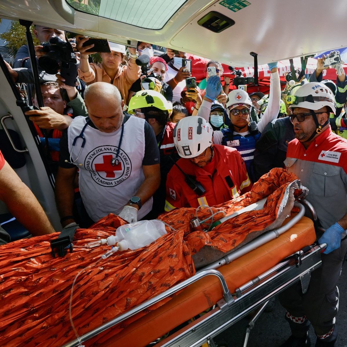 Trapped for 8 days, Venezuelan man pulled alive from building collapse