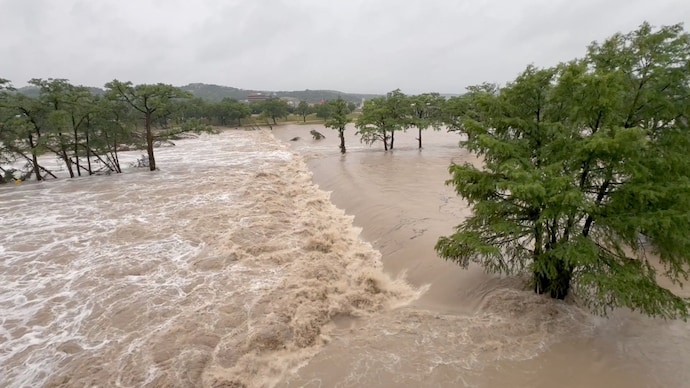 Torrential rains killed two people in Texas as floodwaters swept them away in their vehicles.