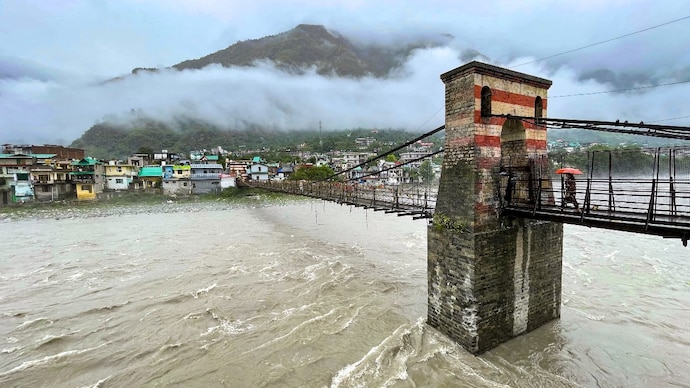 The bridge above the swollen Beas river after its water level rose following heavy rainfall. (Photo: PTI)