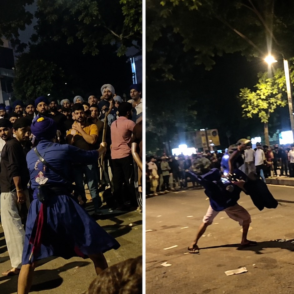 The minute-long footage shows Nihang stepping into the centre of the crowd and performing a series of stick-wielding stunts. 