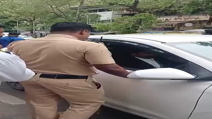 Viral video shows lawyer inside car being towed