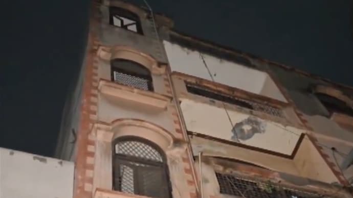 Visuals from the spot showed the four-storey corner building with shuttered shops on the ground floor and three residential floors above.