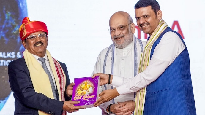 Union Home Minister Amit Shah presents the 'Lokmanya Tilak National Award 2026' to NSA Ajit Doval in the presence of Maharashtra CM Devendra Fadnavis.