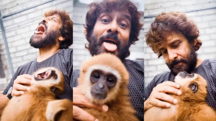 Chiyaan Vikram's photo with Lar Gibbon monkey