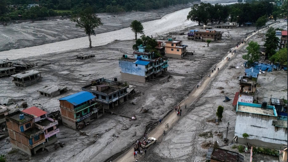 Nepal rescuers battle mud, debris in race to find survivors as toll nears 700