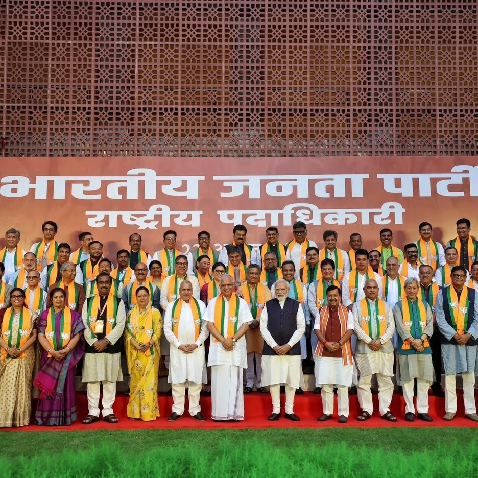 PM Modi with the new BJP team at the national headquarters in New Delhi.