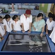 Radha Rajesh with students while teaching using simulations Radha Rajesh with students while teaching using simulations