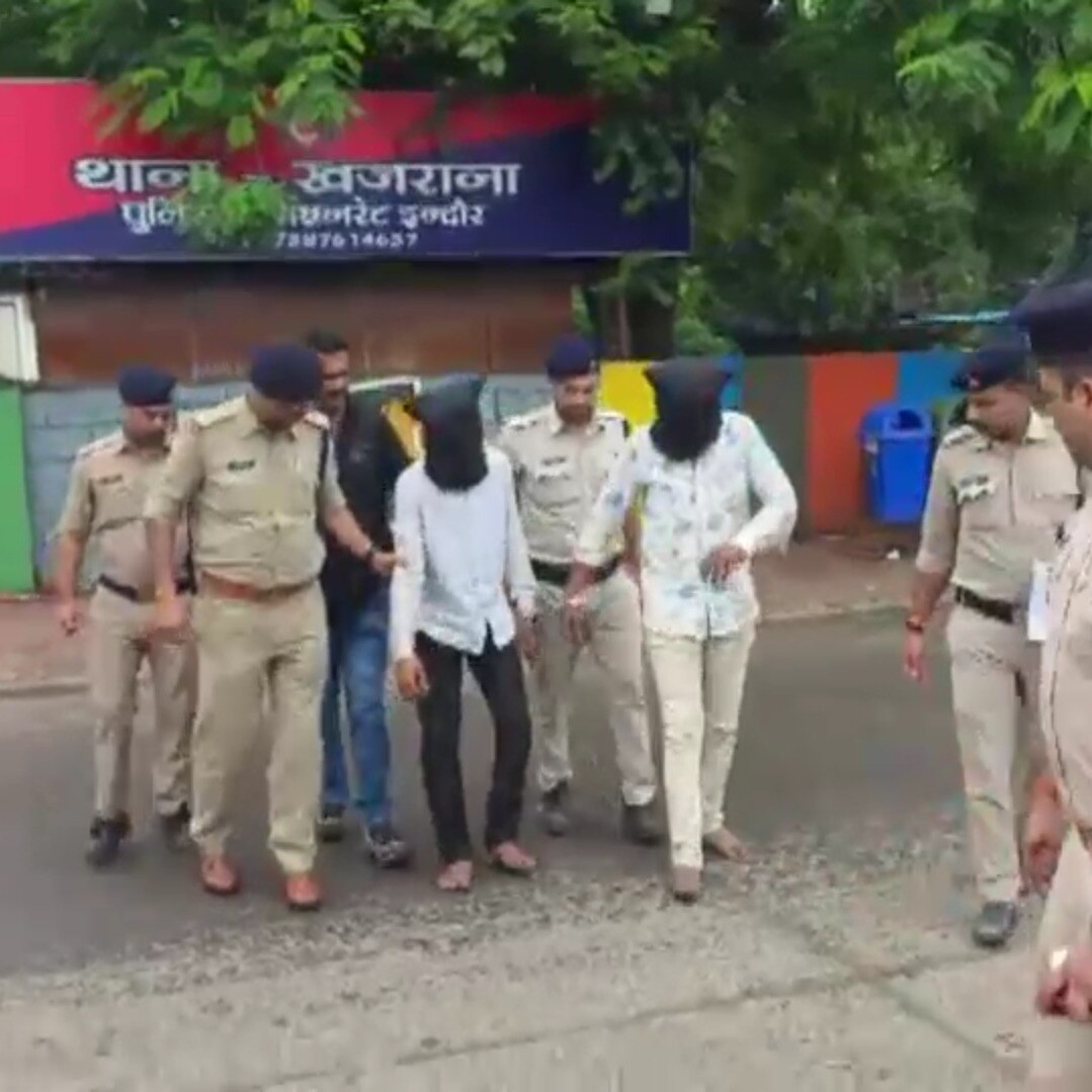 The arrested accused with Indore Police personnel. (Photo: Screengrab/India Today)