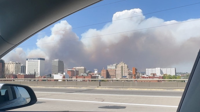 Massive plumes of smoke rise over the city of Spokane, US on August 1, 2026. (Credits: Social media via Reuters) Washington wildfires