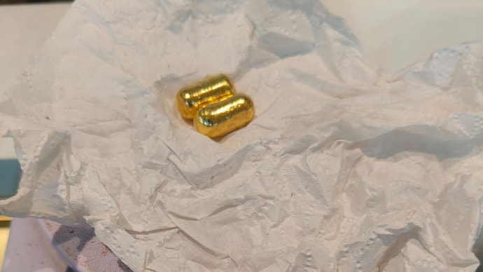 Gold capsules recovered from a passenger’s mouth at Bengaluru airport. (Source: ITG)
